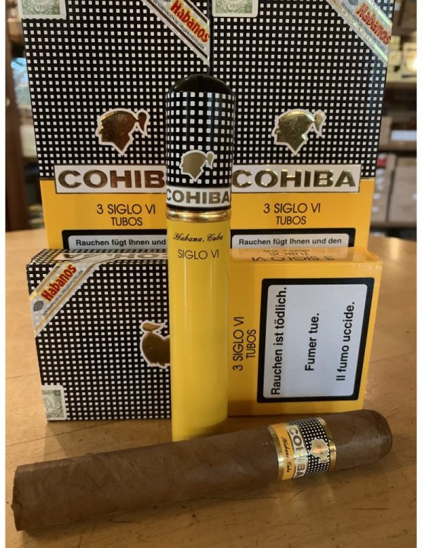 Cohiba 3 siglo vi tubos tubed cigar with packets in the background