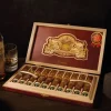 E.P. carrillo encore majestic With alcohol and open box of cigars