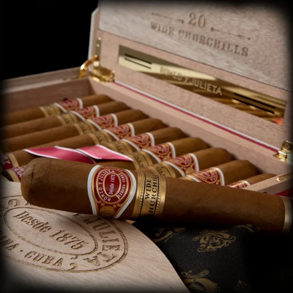 Close shot of romeo y julieta cigars with wooden premium box and black background.