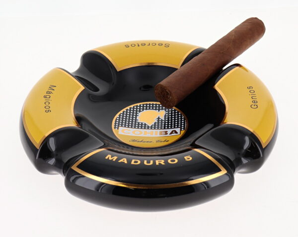 Ashtray cohiba maduro 5 black and yellow with cigar in it